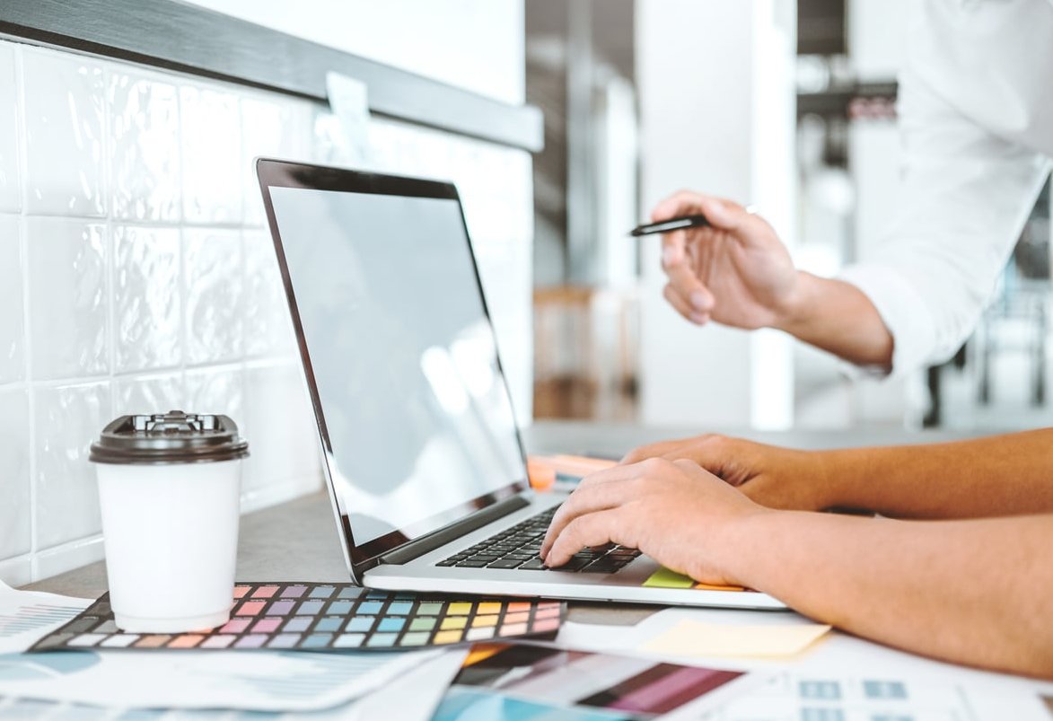 copywriter laptop typing